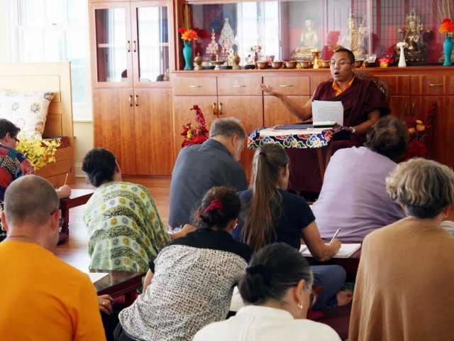 Namdrol la and Class Acarya Ven. Namdrol Gyatso la and students during Tibetan Language Class, a course of instruction entitled Learning Tibetan Language and Ritual. Mindrol Lekshey, 2016.