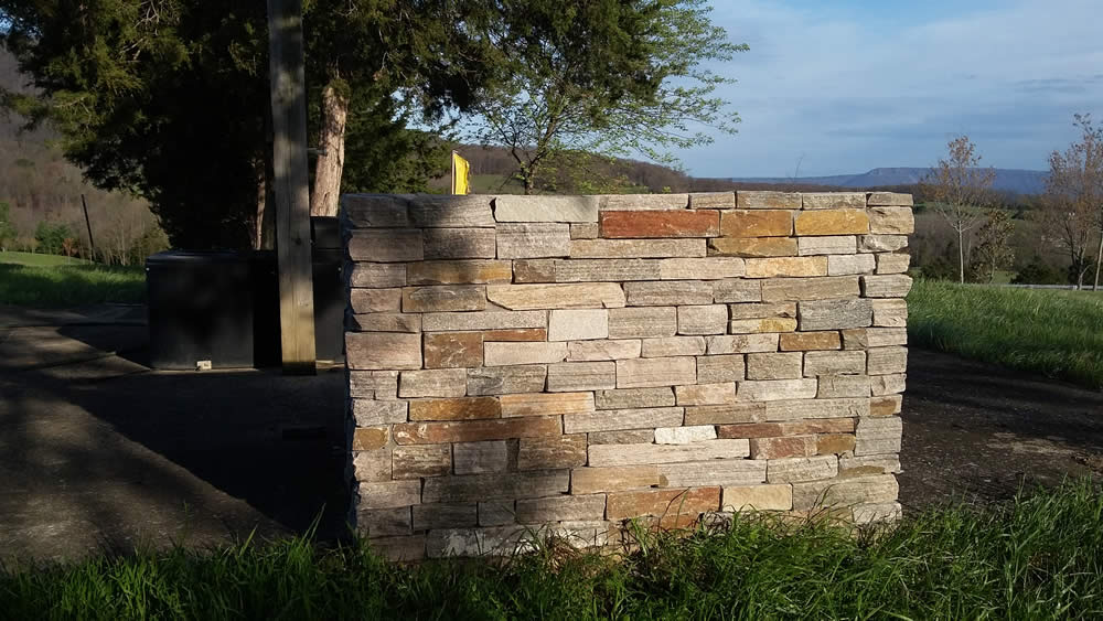 Test wall erected to show selected stone for the temple.