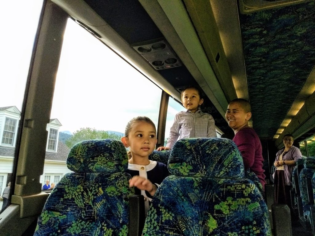 Dungse Rinpoche and Jetsun Rinpoche Board Bus Dungse Rinpoche and Jetsün Rinpoche are first to board the bus